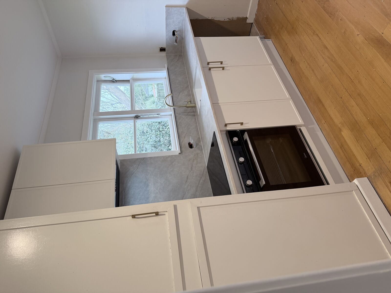Grey stone benchtop kitchen installation, Auckland